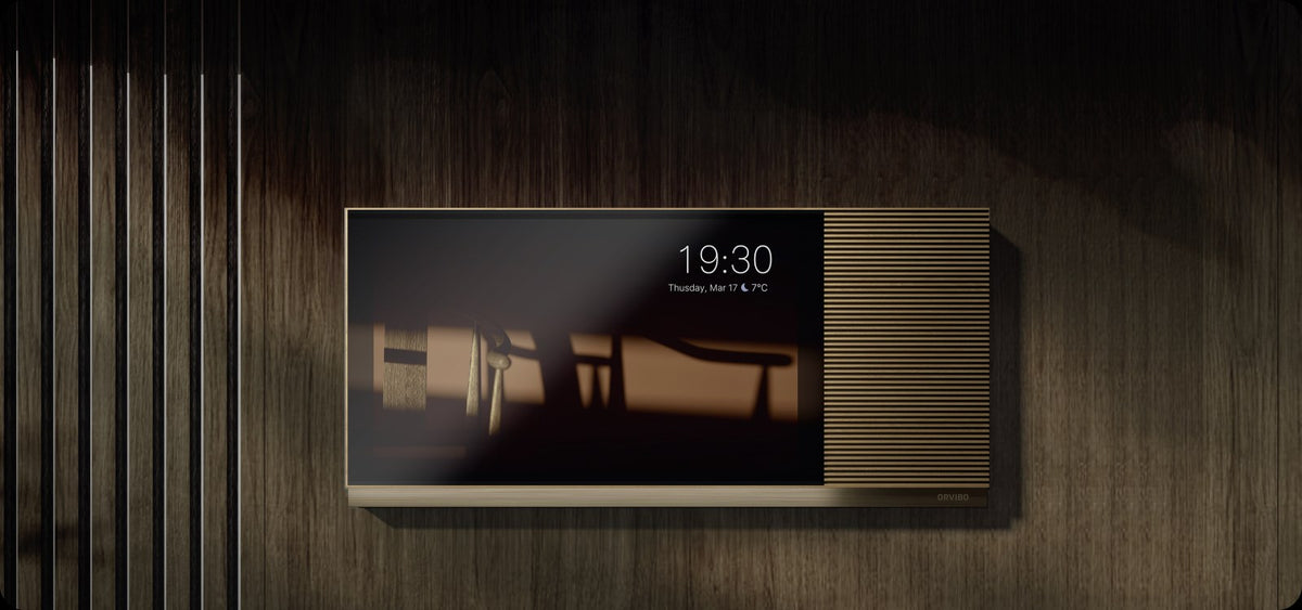 ORVIBO MixPad 7 Ultra with walnut trim on a wood wall