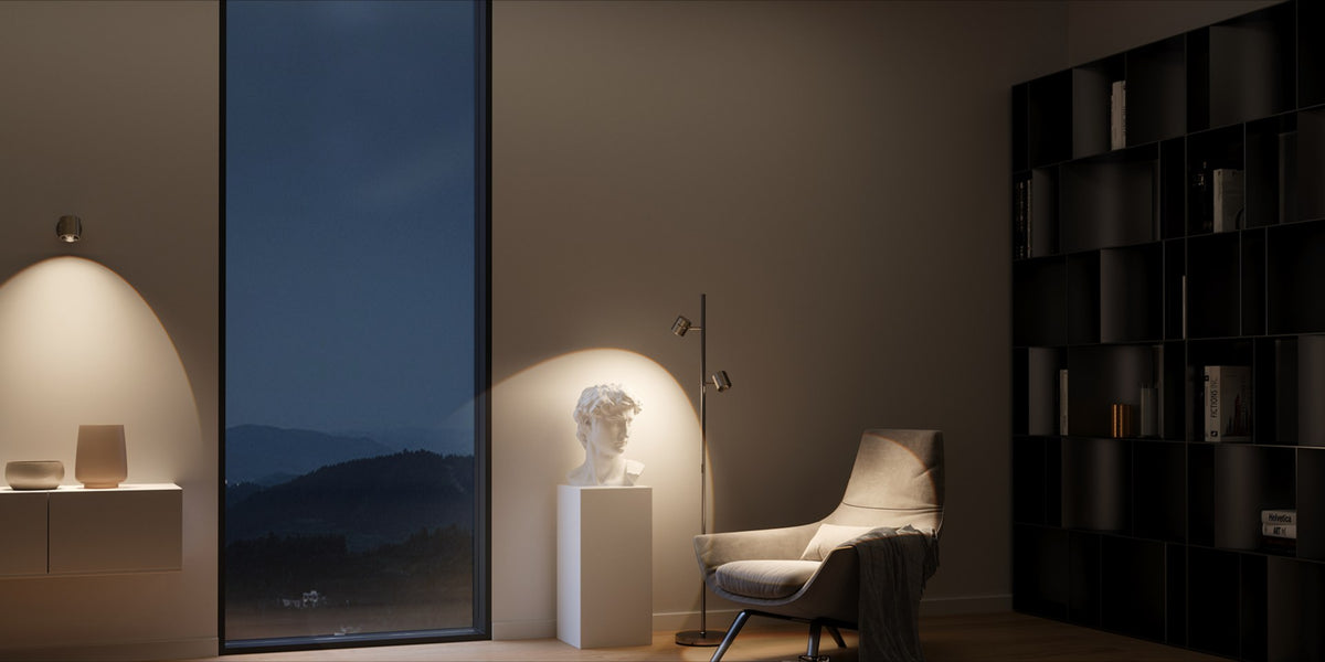 Reading corner lit by a single lamp