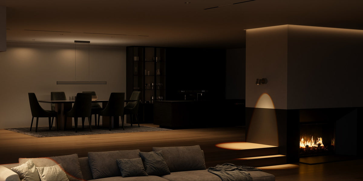 Living room with dimmed lights and a fireplace